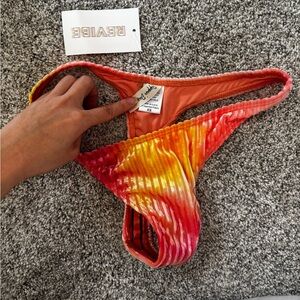 Dippin Daisy’s Pink and Orange Bikini Bottom